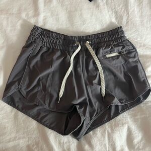 Vuori Women's Athletic Shorts in Charcoal Gray